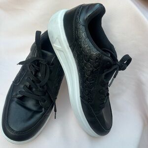 Black Sneakers with Embossed Logo